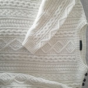 Ivory cable knit sweater...worn but has more life